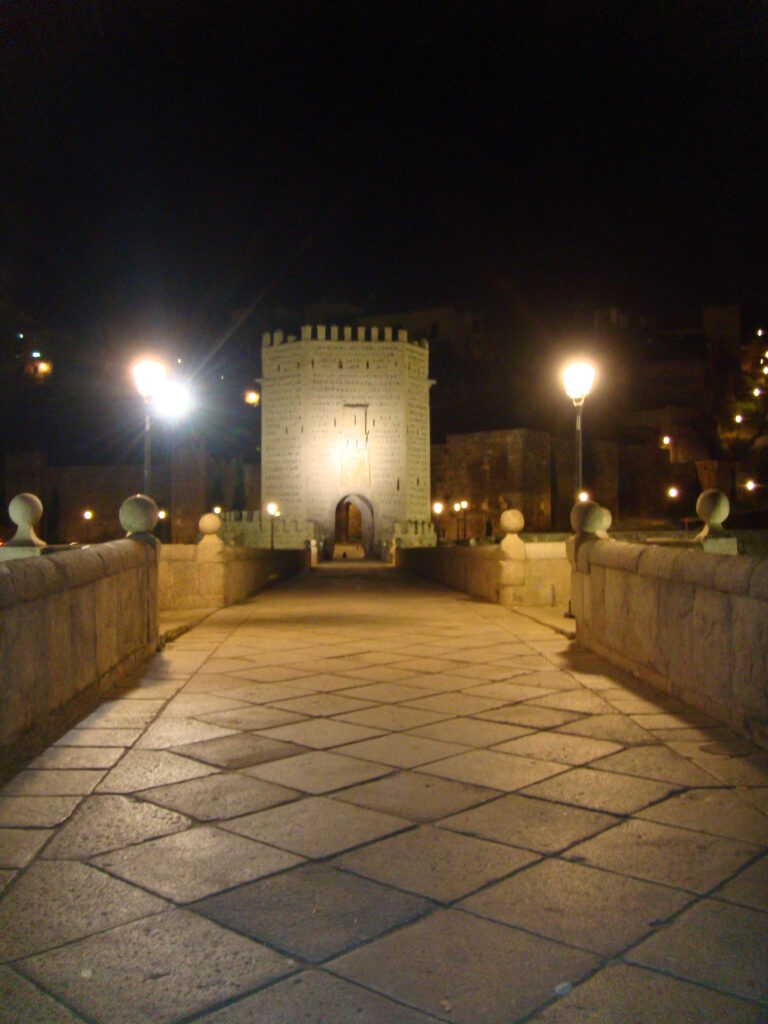 The Alcantara Bridge leading into Toledo across the Tagus.