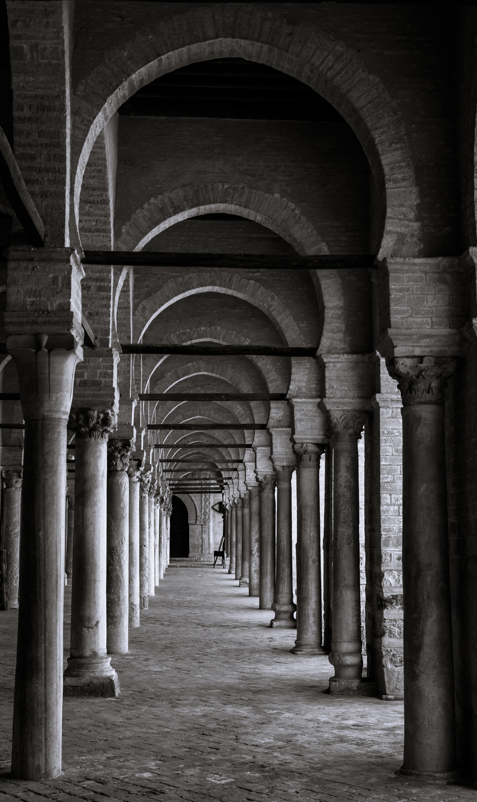 Rows of arcades inside the Great Mosque of Kairouan.