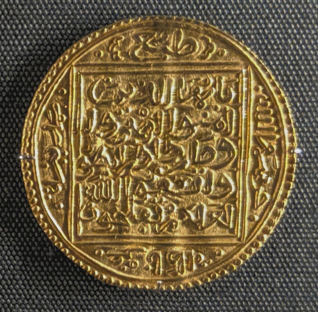 Gold coin minted under Muhammad V of Granada.