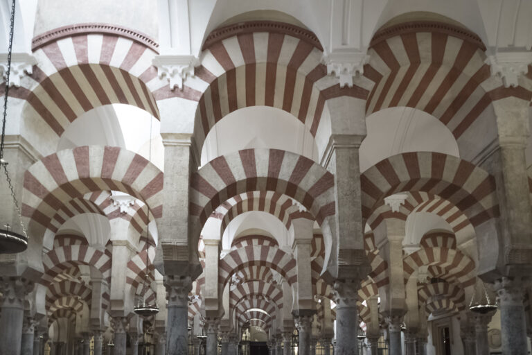 Striped arches in the hypostyle hall of the Mosque-Cathedral of Cordoba.