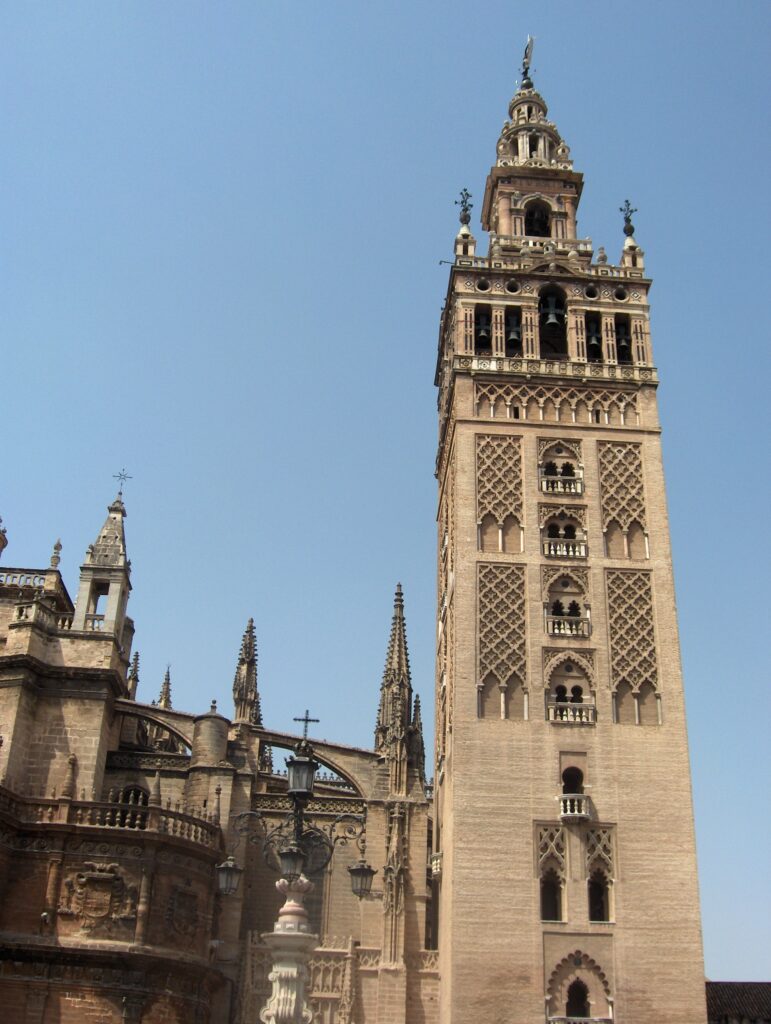 The Giralda tower in Seville, a former Almohad minaret later adapted as a cathedral bell tower.