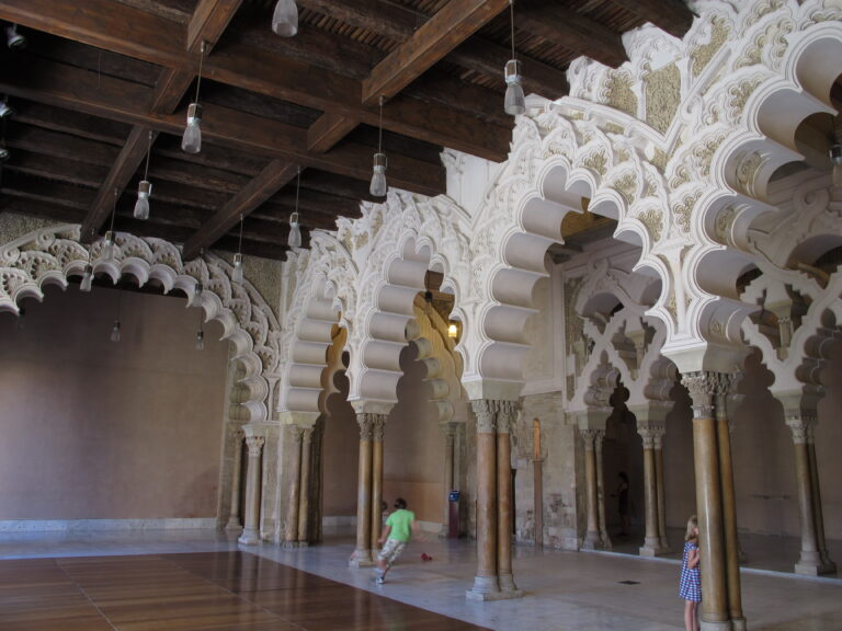 Interlacing arches inside the Islamic palace section of the Aljaferia in Zaragoza.